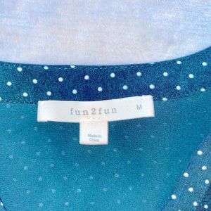 Green polkadot blouse